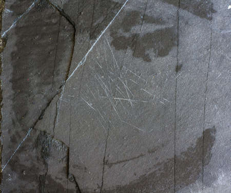 Black stone board as a natural background with copyspaceの写真素材