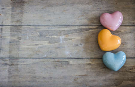 Festive frame with hearts on dark background with copyspaceの写真素材