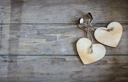 Festive frame with hearts on dark background with copyspaceの写真素材