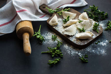 Vareniki (dumplings, pierogi) with cheese before boiling - traditional Ukrainian foodの写真素材