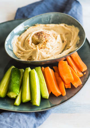 Traditional arabian dish - Humus with fresh organic vegetablesの写真素材