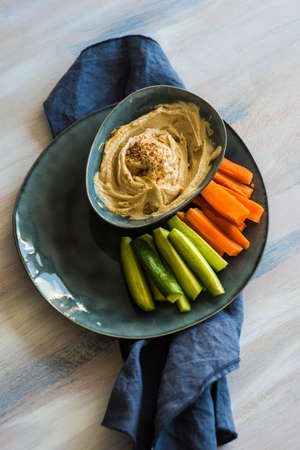 Traditional arabian dish - Humus with fresh organic vegetablesの写真素材
