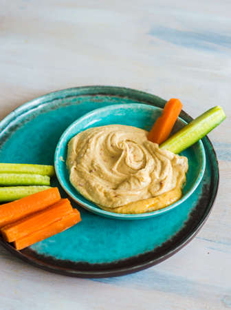 Traditional arabian dish - Humus with fresh organic vegetables