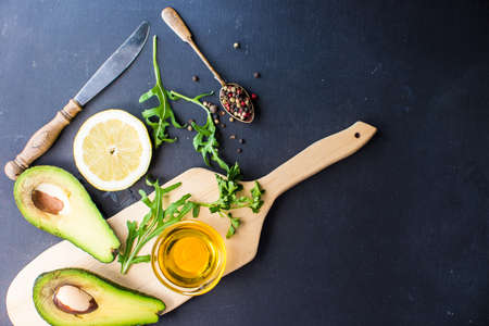 Organic vegetable ingredient for salad on rustic background