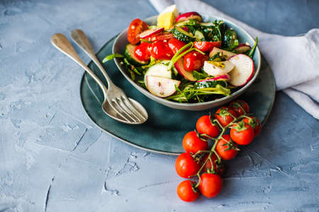 Fresh salad with organic vegetables and boiled eggs for healthy dinnerの写真素材