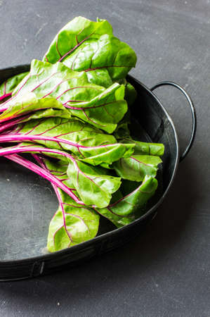 Organic food concept with ingredient for healthy salad - beat leaves