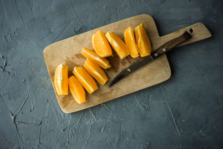 Organic fruits on concrete background