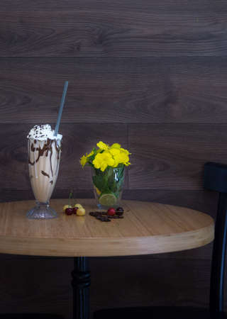 Glass of cold coffee with ice creamの写真素材