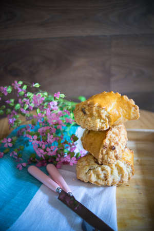 Traditional georgian sweet dessert - kada on the table decorated with summer flowersの写真素材