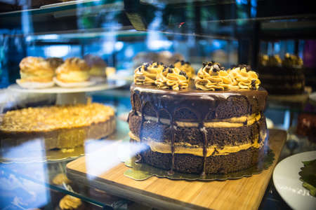 Cakes in a bakery are ready to be bought by someoneの写真素材