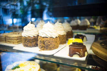 Cakes in a bakery are ready to be bought by someoneの写真素材