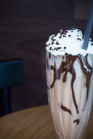 Glass of cold coffee with ice cream