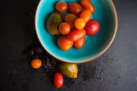 Fresh vegetables on the old wooden tableの写真素材