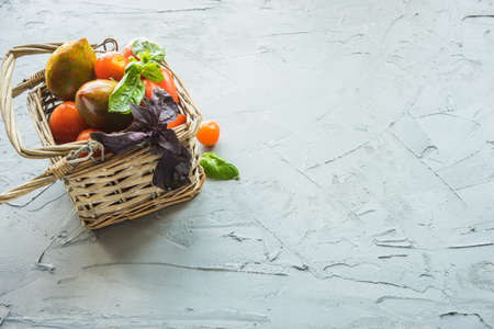 Fresh vegetables on the old wooden tableの写真素材