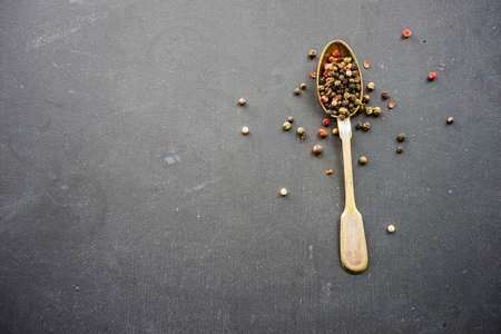 Organic food concept with hot chilli peppers on dark wooden background with copyspaceの写真素材