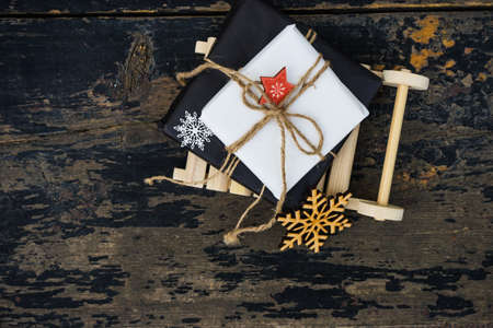 Christmas presents in rustic style with holiday decorations, selective focusの写真素材