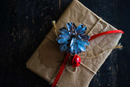 Christmas presents in rustic style with holiday decorations, selective focusの写真素材