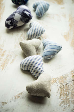 Heart shaped decorations on wooden  rustic background with copyspaceの写真素材