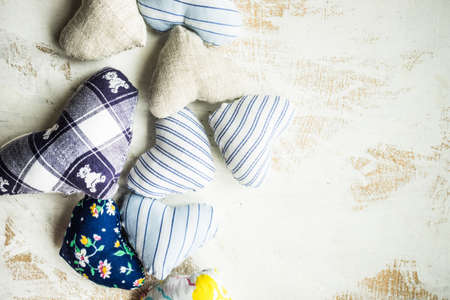 Heart shaped decorations on wooden  rustic background with copyspaceの写真素材