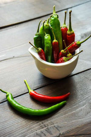 Red hot chilli peppers on dark backgroundの写真素材