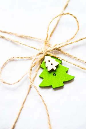 Christmas festive decorated gifts on wooden background, selective focus and copyspace