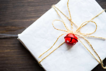 Christmas festive decorated gifts on wooden background, selective focus and copyspace