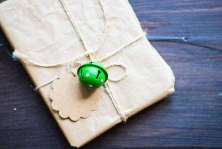 Christmas festive decorated gifts on wooden background, selective focus and copyspace