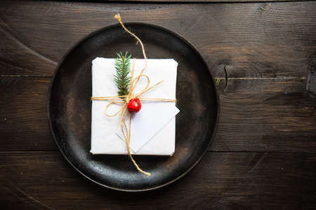Festive table setting for Christmas holiday dinner with vintage flatware and decorationの写真素材