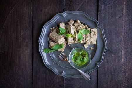 Traditional turkish sweets - pahlava with fresh mint leaves and mint tea