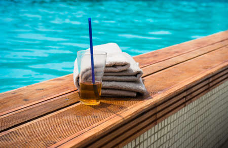 Blue swimming pool rippled water detail as a relax concept