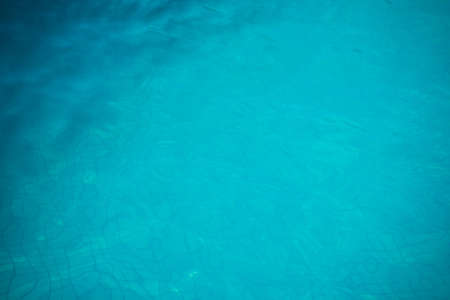 Blue swimming pool rippled water detail as a relax conceptの写真素材