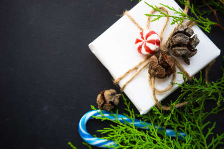 Festive Christmas frame with christmas tree branches and decoration with copyspace