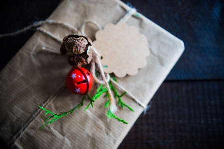 Christmas sweets and gift boxes on rustic background with copyspaceの写真素材