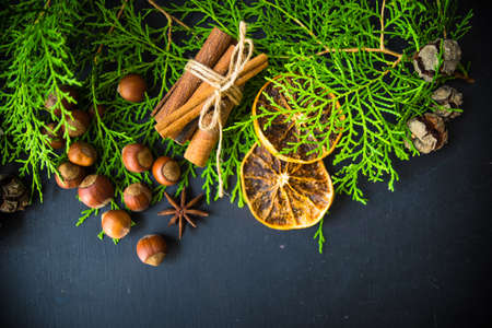 Festive Christmas frame with christmas tree branches and decoration with copyspaceの写真素材