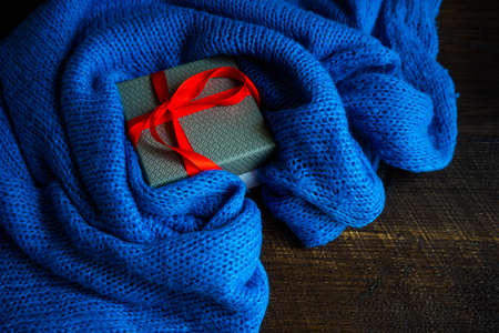 Christmas gift boxes on rustic background as a holiday concept with copyspaceの写真素材