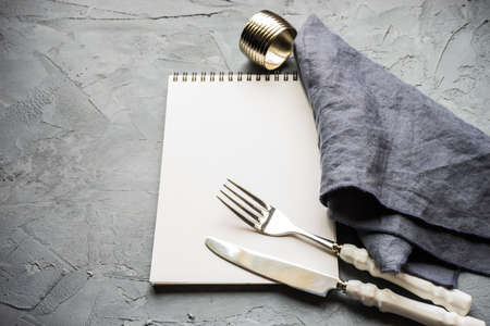 Rustic table setting with vintage tableware   ongrey concrete  table with copyspaceの写真素材
