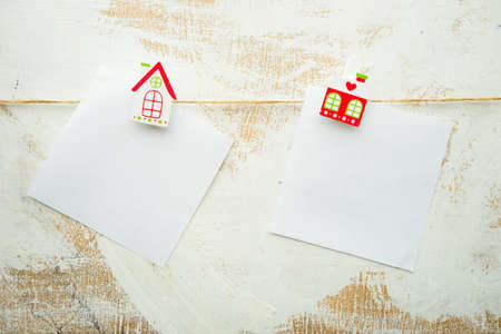 Festive Christmas concept with snow and decoration on rustic flatlay and frame with copyspaceの写真素材