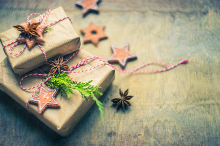 Christmas present on wooden background with copy spaceの写真素材