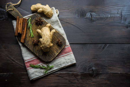 Organic food concept for preparing ginger tea on rustic wooden table with copy spaceの写真素材