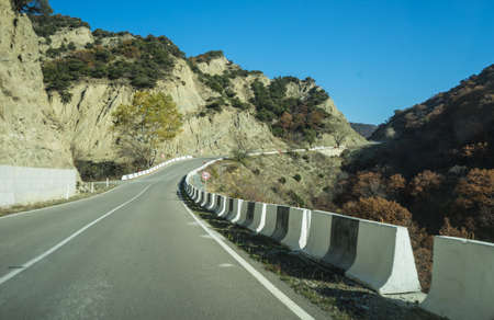 Road in autumnal landscape in Caucasus mountain in Georgia
