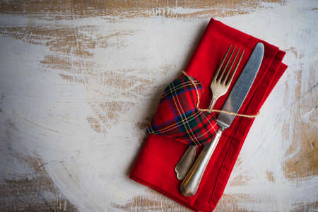 Rustic table setting for festive  dinner in Valentines Day with vintage heart-shaped decor on concrete grey backgroundの写真素材