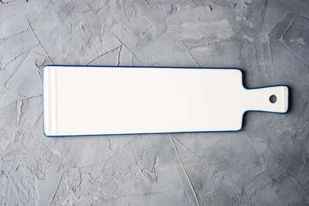 Empty ceramic tableware on dark wooden tableの写真素材