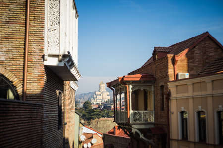 Georgia - Tbilisi. Traditional architecture of Old Tbilisi in sunny day. Mix of ancient and modern...