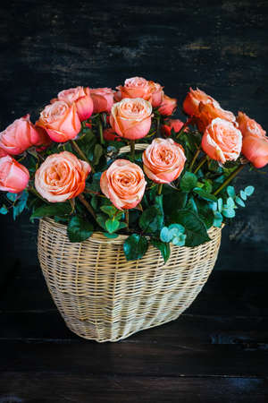 Busket with fresh roses as a anniversary card conceptの写真素材