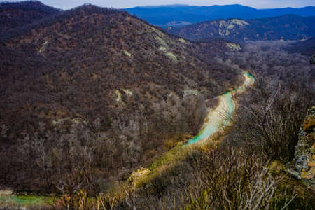 River in the georgian part of Caucasus mountain in winter timeの写真素材