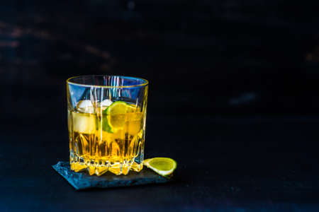 Glacc of cognac with ice and limeの写真素材