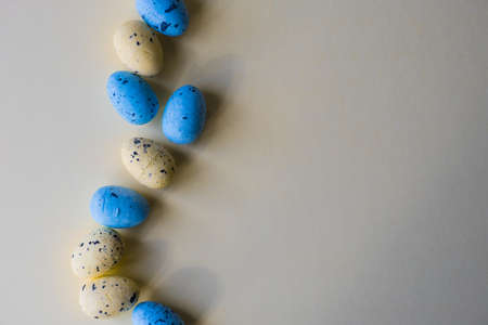 Conceptual Easter holiday card with easter eggs. Copy spaceの写真素材