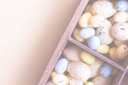 Conceptual Easter holiday card with easter eggs. Copy spaceの写真素材