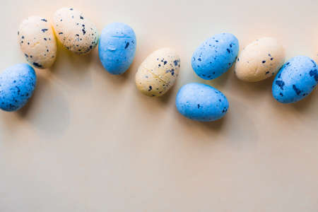 Conceptual Easter holiday card with easter eggs. Copy spaceの写真素材