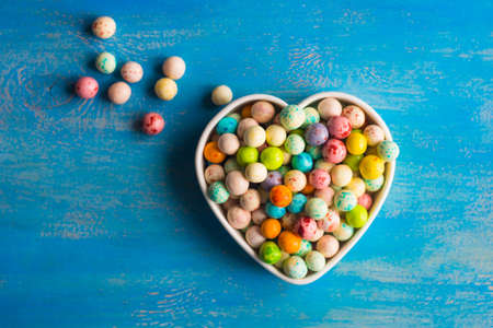 Traditional turkish snack leblebi in a bowl on rustic background with copy spaceの写真素材